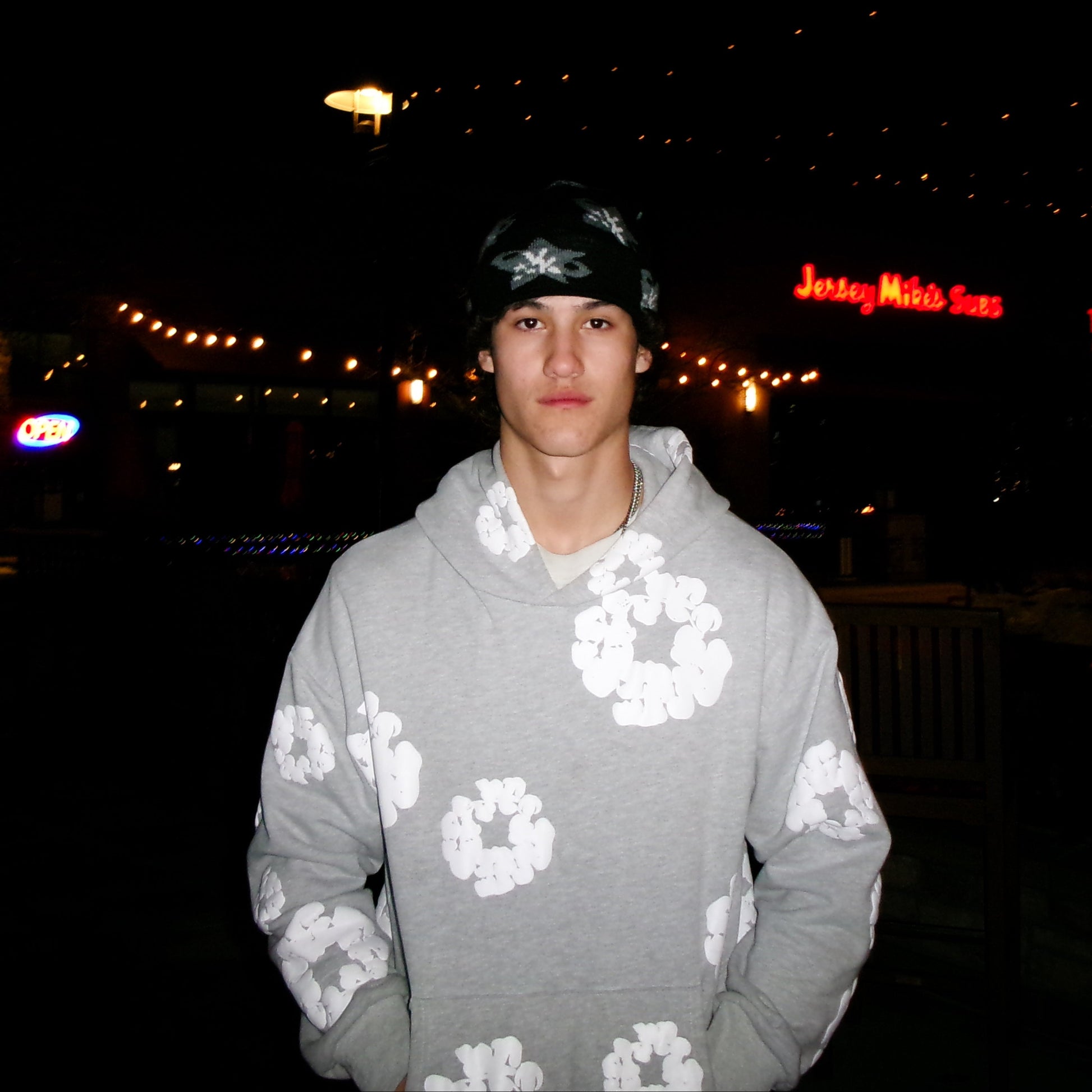 Diego in longmont Wearing the art of disruption beanie.